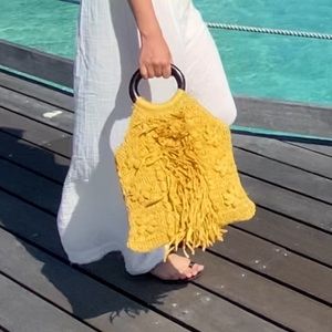 anthropologie yellow weaved bag